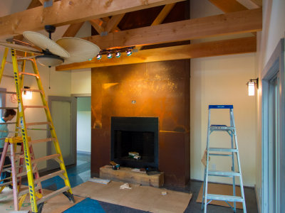 Steel wrapped fireplace looks fantastic