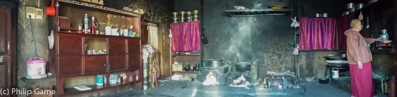 The abbess of Gyangong Ani Gompa makes tea in the nunnery kitchen