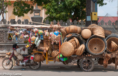 Basket vendor takes a break, Kratie