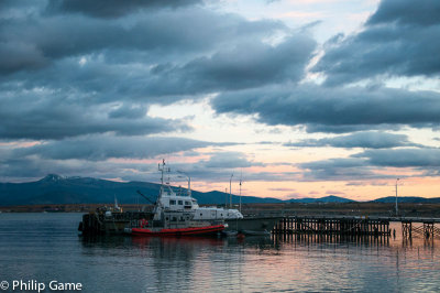 Dawn breaks over Sentoret Channel at Puerto Natales