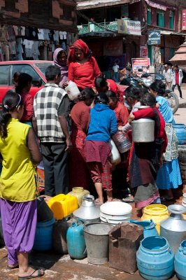 Women gather to collect drinking water