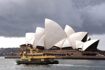 Passenger ferry passing the Sydney Opera House as it departs Circular Quay