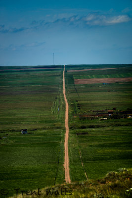 Saskatchewan grid road from a Bute in Grasslands National Park.