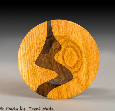Oak Platter with Black Walnut inlay in the shape of a woman sitting.
