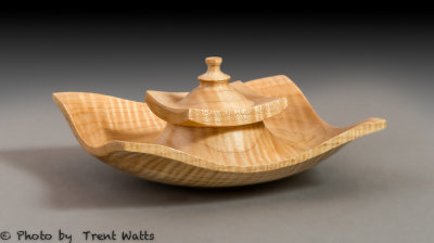 Oriental style square box of figured maple.