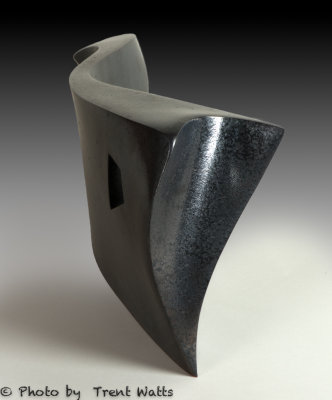 Metal inspired ceramic sculpture.