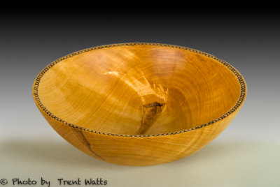 Birch bowl with decorated rim.