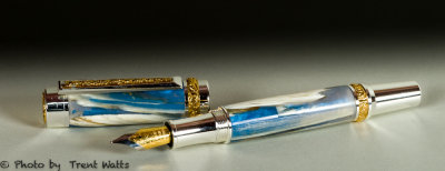Canadian fountain pen / sterling sliver & titanium gold /  musk ox horn & intererence blue resin.