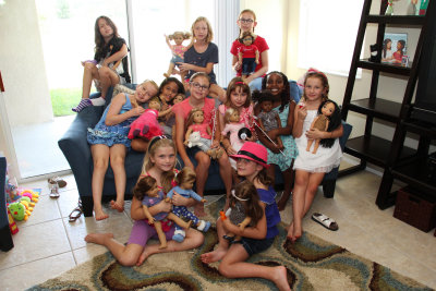 All the girls and their dolls! (that's a lot of estrogen and sugar high right there!)