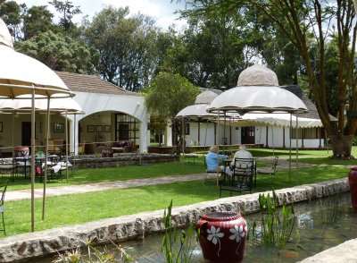 Outdoor restaurant seating area at the Club