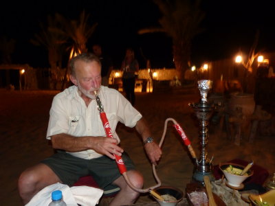 Jim tries the hookah pipe - it's quite a bit bigger than the pipe he usually smokes!