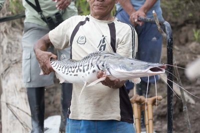 Fisherman displays his catch