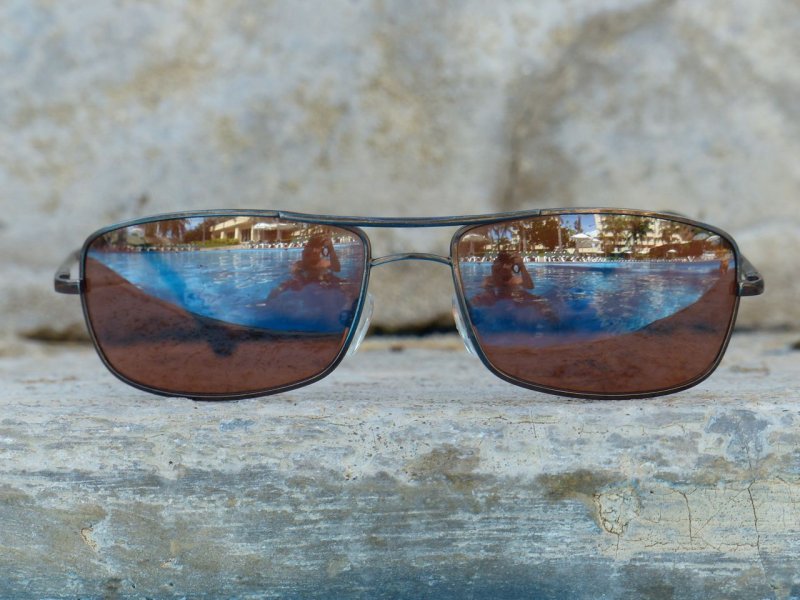 Mayan Palace Pool Sunglasses Reflection