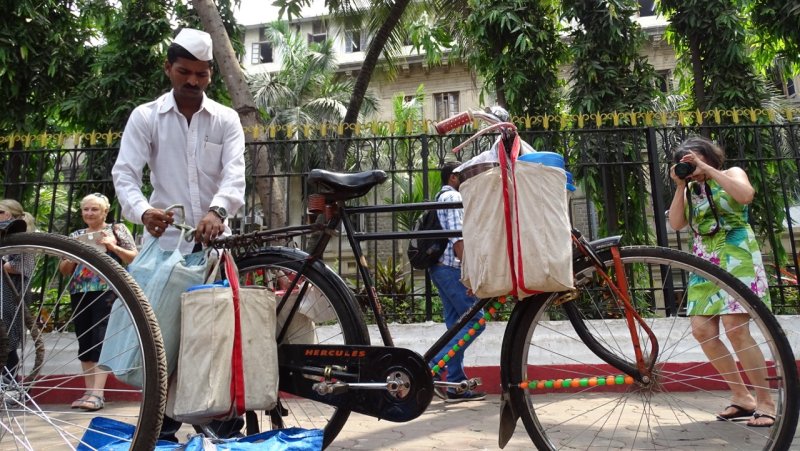 Dabbawalla Preparing for Lunch Deliveries