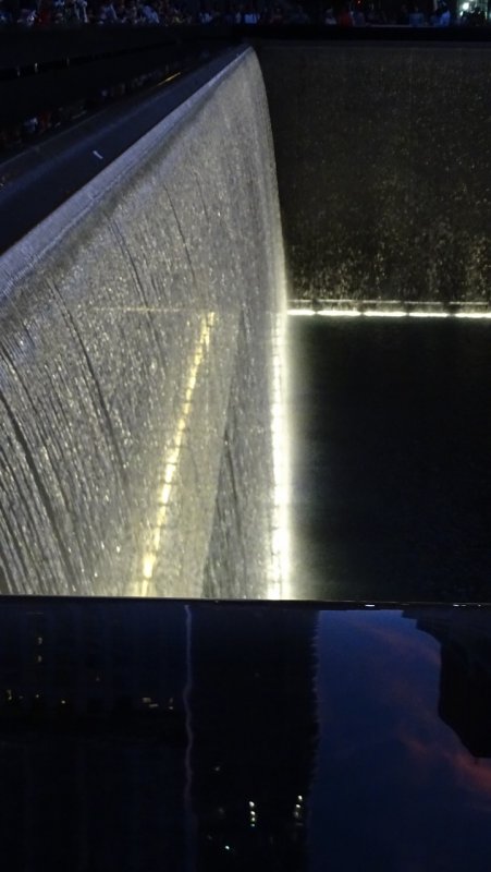 9/11 memorial pool waterfall at night