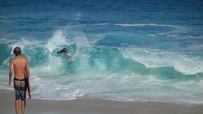 Skimboarders