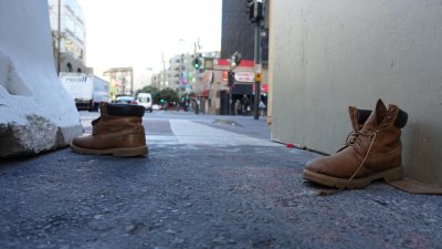 Someone's boots on 7th Street