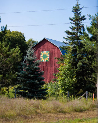 Barn with Green n Yellow Symbol