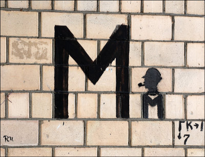 M (black)