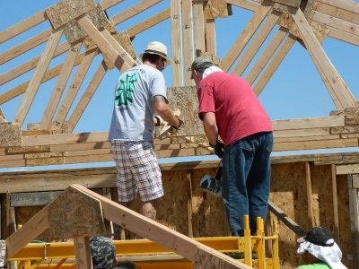 Doug and Chris raising the trusses