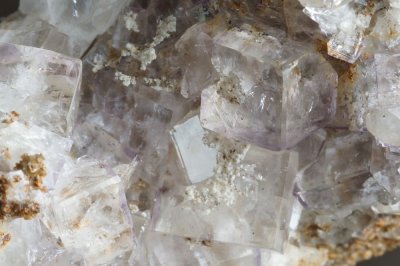 Fluorite cubes to 12 mm with tetrahexahedral edges and hexoctahedral corners. Fothergill Sike, Birkett Common, Kirkby Stephen.