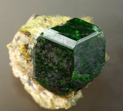 Uvarovite crystal, 12 mm across. Taghonak, Kotizabi, Hindu Kush, Andarab Region, Baghlan Province, Afghanistan.