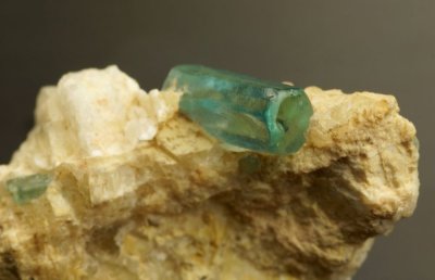 Apatite, 9 mm gem crystal on 34 mm matrix. Onh Bin Yee Htwet , Le-Oo (Le U), northeast of Mogok, Burma (Myanmar).