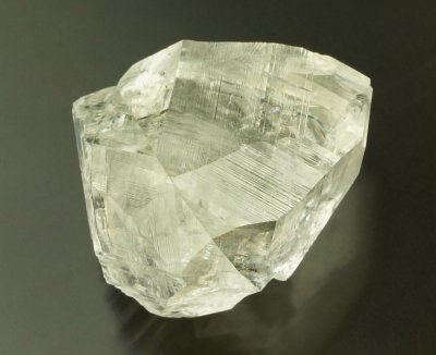 Gemmy lustrous calcite twin ({00.1}). 1450 Level, Meikle Mine, Bootstrap District, near Carlin, Elko County, Nevada, USA. 3 cm.