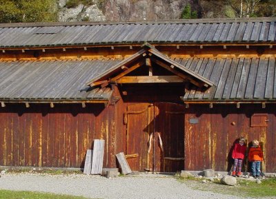 Reconstructed Viking house at Landa, Forsand, near Lysefjord. Serena and James for scale.