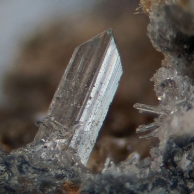 Anglesite, Dene Quarry, Cromford, Derbyshire. The crystal is about 2.5 mm long.