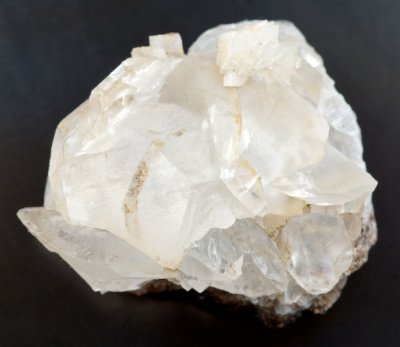 Calcite rhombohedra to 19 mm in 3 cm group, Seata Mine, Aysgarth, Wensleydale.