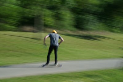 Skateboarder next to the bayou