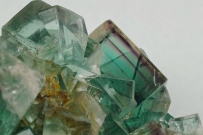 Detail of Middlehope Shield (Old Vein) green fluorite showing thin purple phantoms in a crystal 22 mm on edge.  