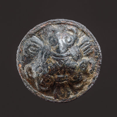 Domed brooch with three Borre-style bear heads, 25 mm, copper alloy with remnants of gilding, 10th century.