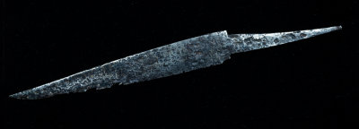 European seax with decoration of opposing stamped triangles, 32 cm long. Wheeler III, 8th-10th C. 