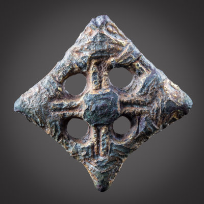 Lozenge brooch, Borre style, 9th C, gilt copper alloy with tinned reverse. Thorpe Bassett, North Yorkshire.