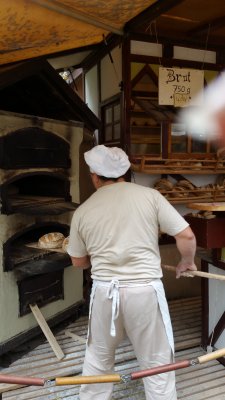 Baking bread in the open during an open air festival