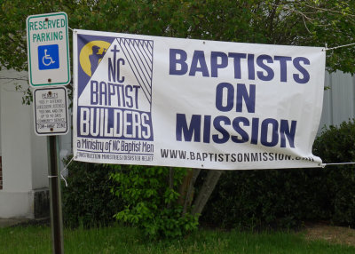 OUR LOGO/SIGN, DISPLAYED OUTSIDE THE CHURCH