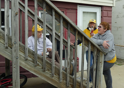 TAKING A LUNCH BREAK ON THE STEPS ACROSS THE STREET