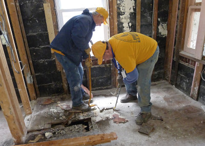 TEAMWORK FOR FLOORING AND SUB-FLOOR REMOVAL