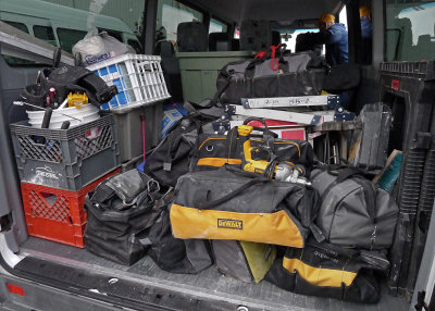 A LOT OF TOOL BAGS, BUT THE TEAM MEMBERS LIKE TO USE THEIR OWN TOOLS AND EQUIPMENT