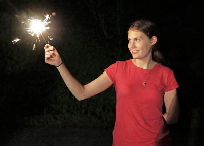 GRANDDAUGHTER MIRI'S FRIEND, SARAH, GETTING A HEAD START ON THIS YEAR'S 4th OF JULY CELEBRATION  -  ISO 6400