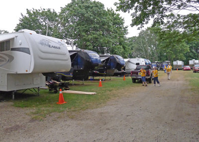 TRAILER ROW  - THE ROAD LEADS TO THE SHOWER TRAILERS AND THE WOMEN'S BUNK TRAILER