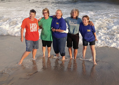 THE WATER WAS ROUGH  -  WE HAD TO GET THE PHOTO QUICKLY, BEFORE THEY ALL SANK UP TO THEIR KNEES IN THE SAND!