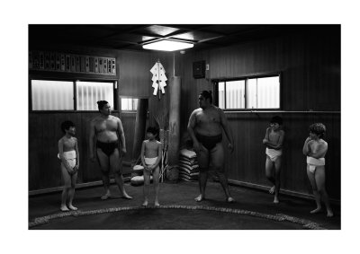 Joseph (second right) at sumo training