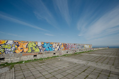 Sitting by the graffiti