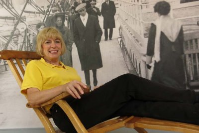 Ginny tries out a Titanic deck chair (replica)