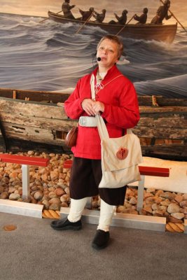 Interpreter telling of whaling from Red Bay