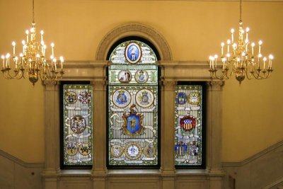 Stained glass window depicting the history of Massachusetts through the Revolutionary war