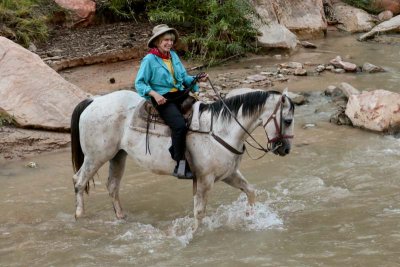 Ginny crossing the Virgin River in Zion